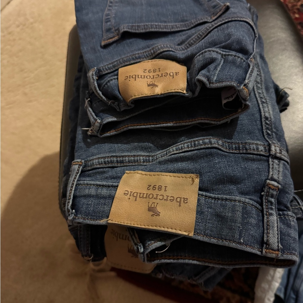 Three pairs of Abercrombie kids jeans skinny a boys sizes 13-14 skinny Preownd